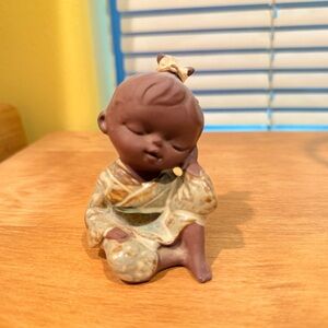 Avon ceramic oriental baby doll